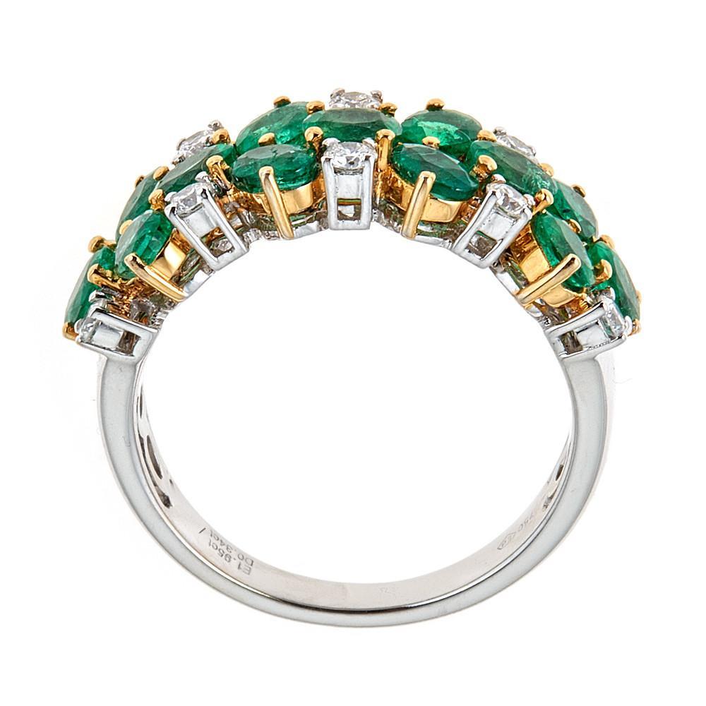 1.95 Carat Oval Emerald and 0.34 Carat Round Diamond Ring in 18 Karat White Gold

Cocktail ring, featuring oval cut emeralds along with brilliant, white, round diamonds. Fashioned in two-toned gold. Perfect on its own, as well as for stacking.