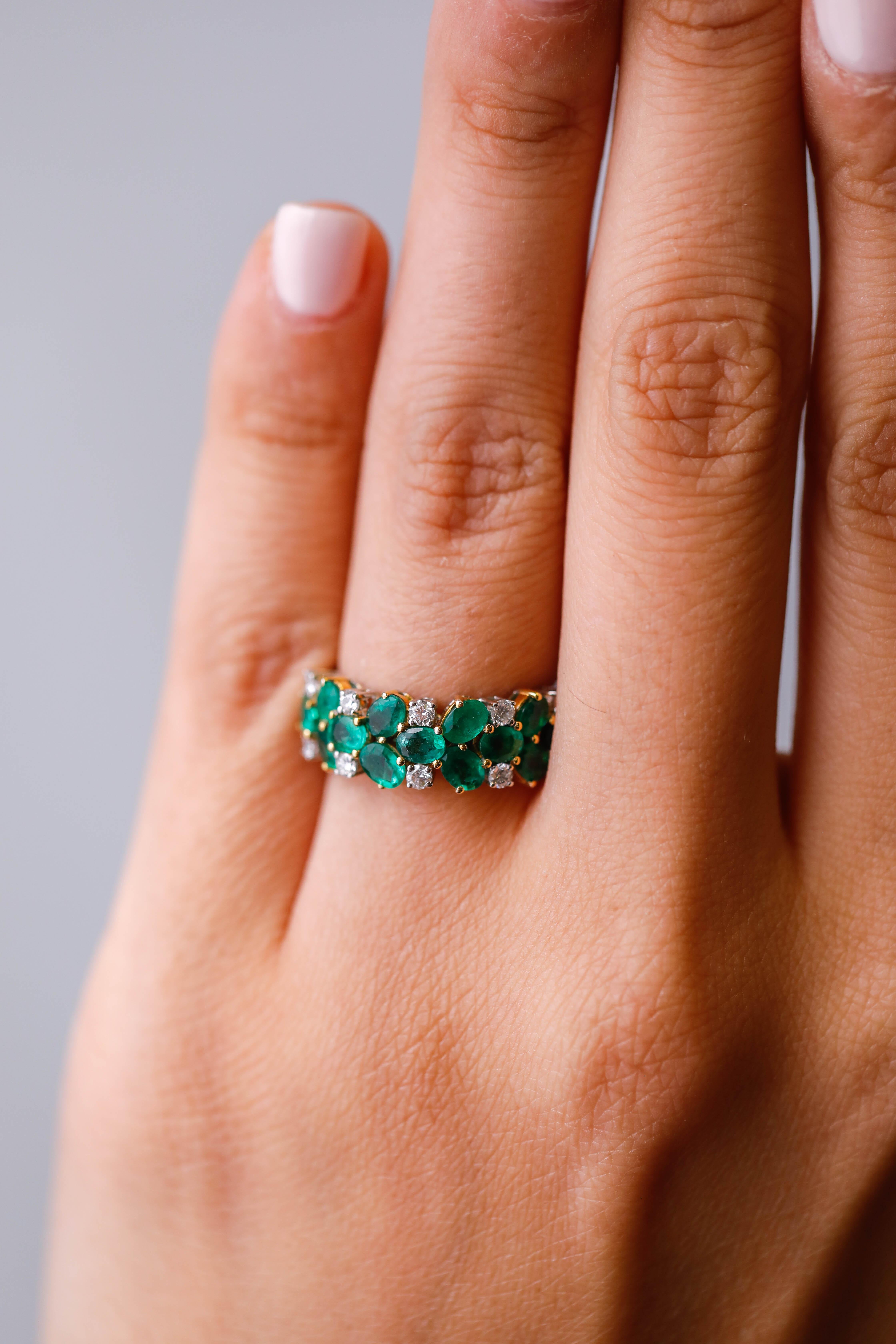 Contemporary 1.95 Carat Oval Emerald and 0.34 Carat Round Diamond Ring in 18 Karat White Gold