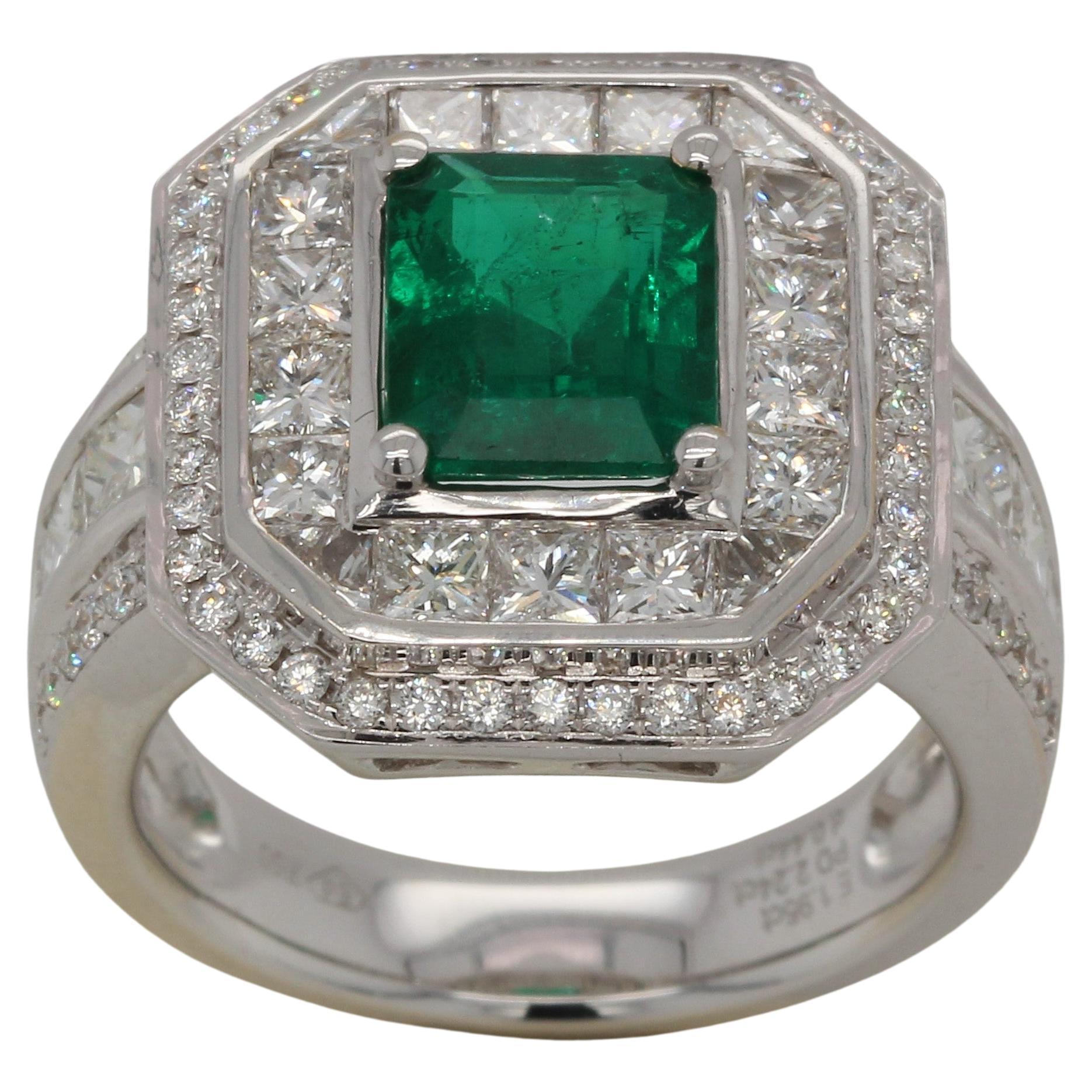 Emerald Cut 1.95 Carat Emerald and Diamond Ring in 18 Karat Gold For Sale