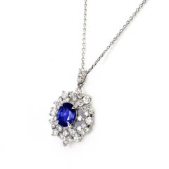 1.95 Carat Natural Royal Blue Sapphire and Diamond Pendant Made in Platinum