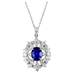 1.95 Carat Natural Royal Blue Sapphire and Diamond Pendant Made in Platinum