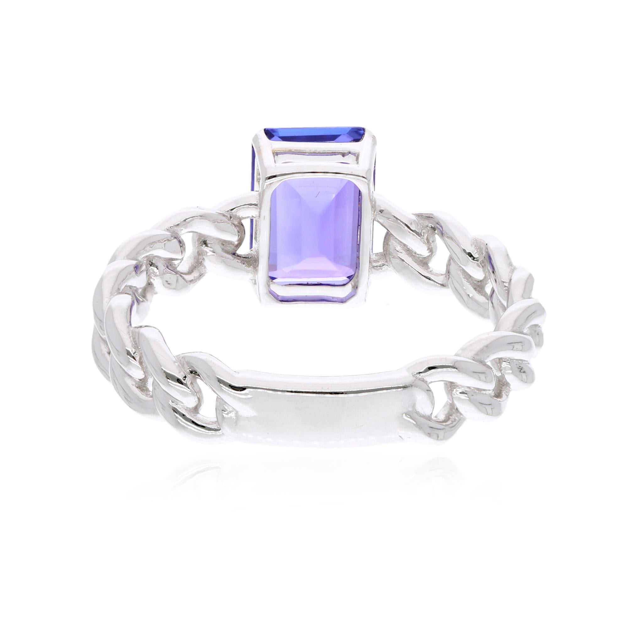 Modern 1.95 Carat Solitaire Emerald Cut Tanzanite Ring Zigzag Band 18k White Gold For Sale