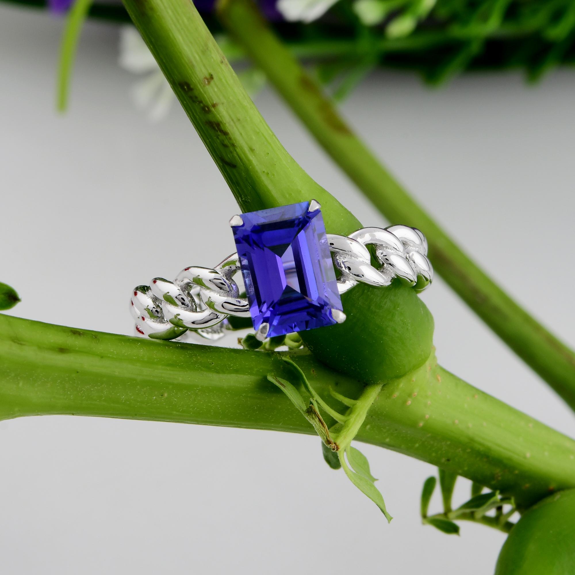 1.95 Carat Solitaire Emerald Cut Tanzanite Ring Zigzag Band 18k White Gold For Sale 1