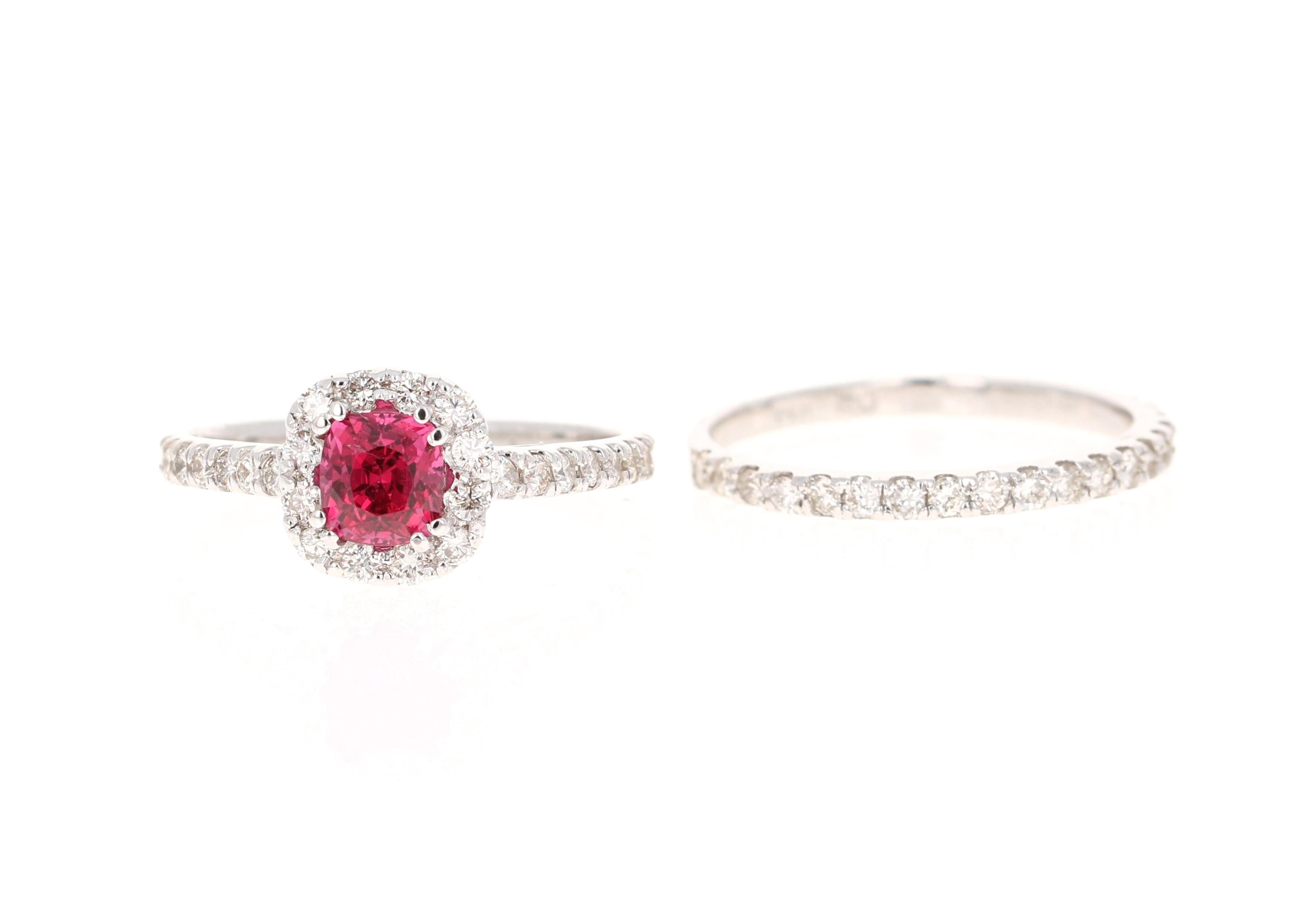 This ring has a gorgeous natural Cushion Cut Red Spinel that weighs 0.90 carats and is surrounded by 60 Round Cut Diamonds that weigh 1.05 carats.  The Clarity and Color of the diamonds is VS2-H.  The total carat weight of the ring is 1.95