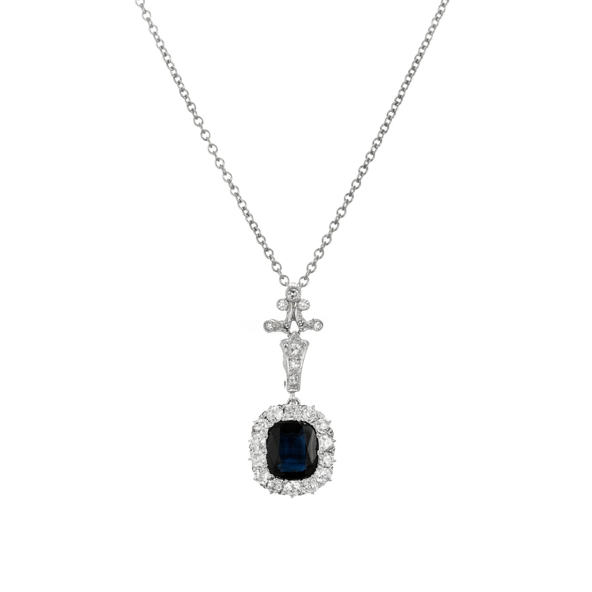 1890's Victorian royal deep blue natural platinum sapphire pendant necklace. At the center of this exquisite piece is a cushion cut 1.95ct rich deep blue sapphire mounted in a platinum setting with a halo of single cut diamonds. The bail is also