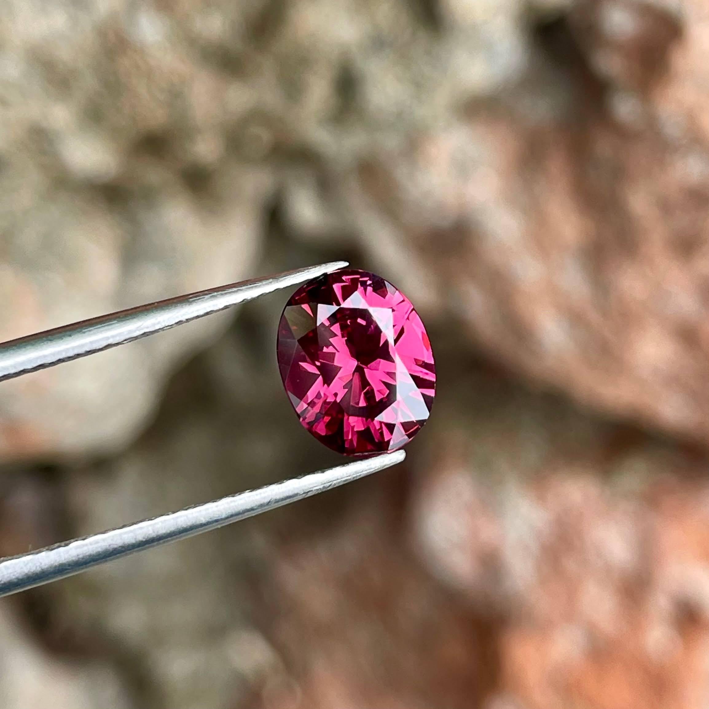 Modern 1.95 Carats Deep Pink Garnet Stone Oval Cut Natural Tanzanian Gemstone For Sale