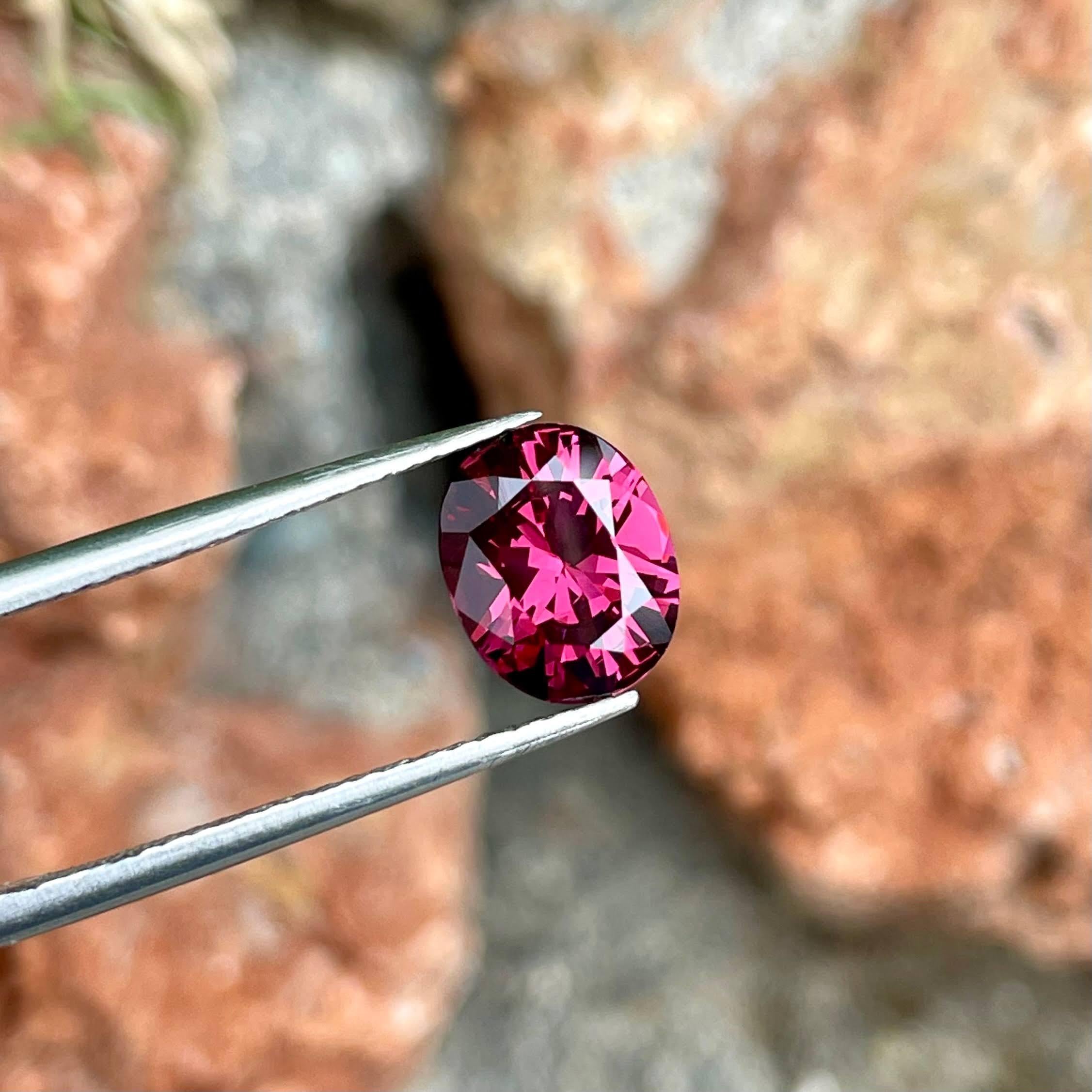 Women's or Men's 1.95 Carats Deep Pink Garnet Stone Oval Cut Natural Tanzanian Gemstone For Sale