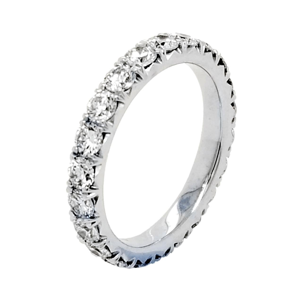 This beautiful Eternity Ring maximizes brilliance of the diamonds by setting them in French Pave style. The ring is in 14K White gild with total of 1.95 Ct  Natural Round Brilliant diamonds.