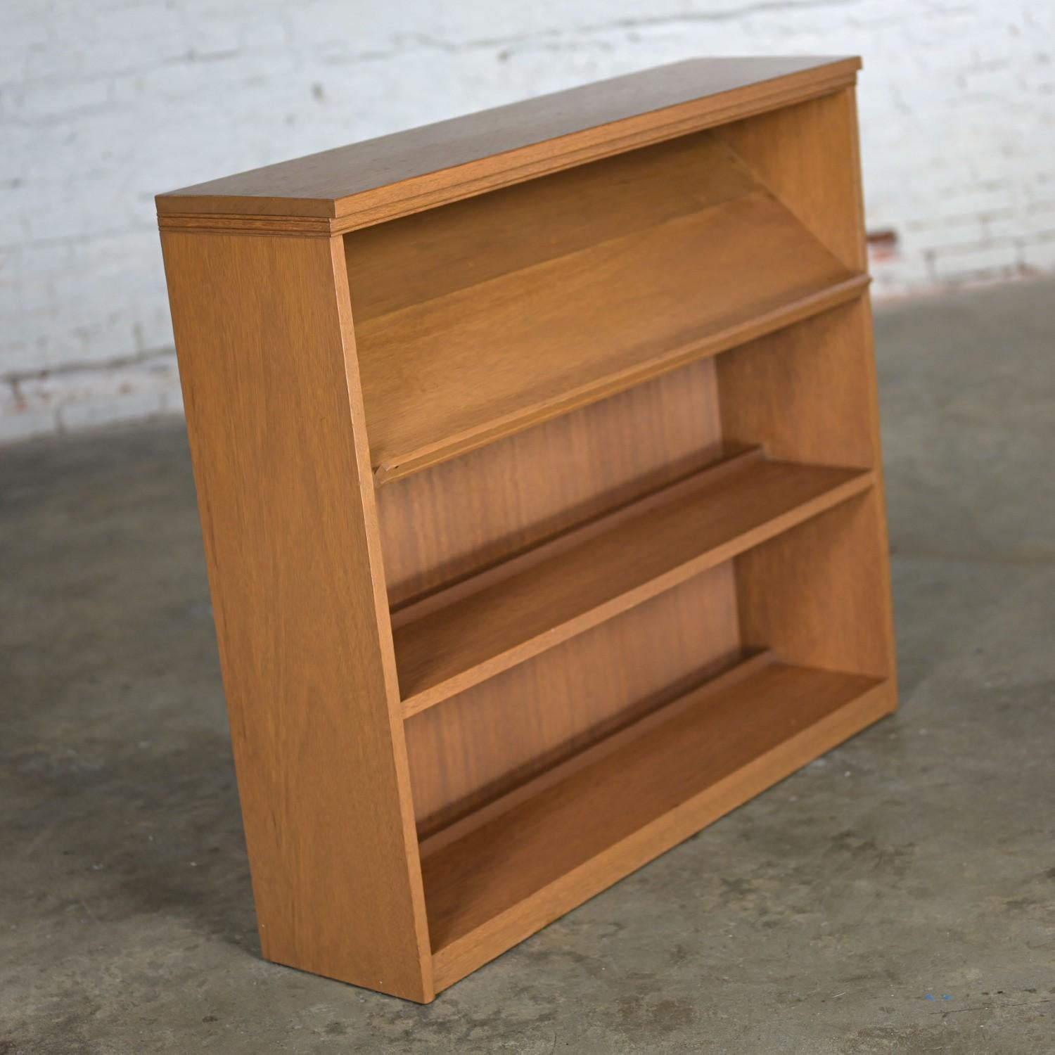 1950-1960’s Mid-Century Modern Low Mahogany Bookcase with Slanted Display Shelf For Sale 8