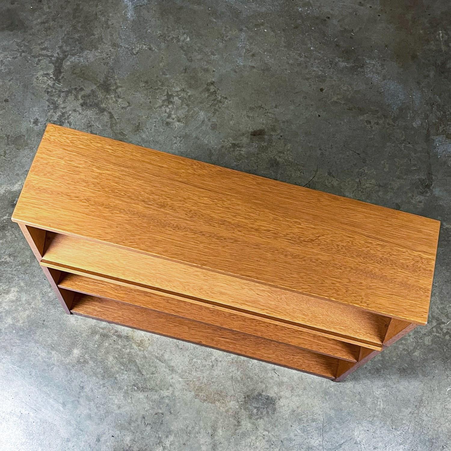 20th Century 1950-1960’s Mid-Century Modern Low Mahogany Bookcase with Slanted Display Shelf For Sale