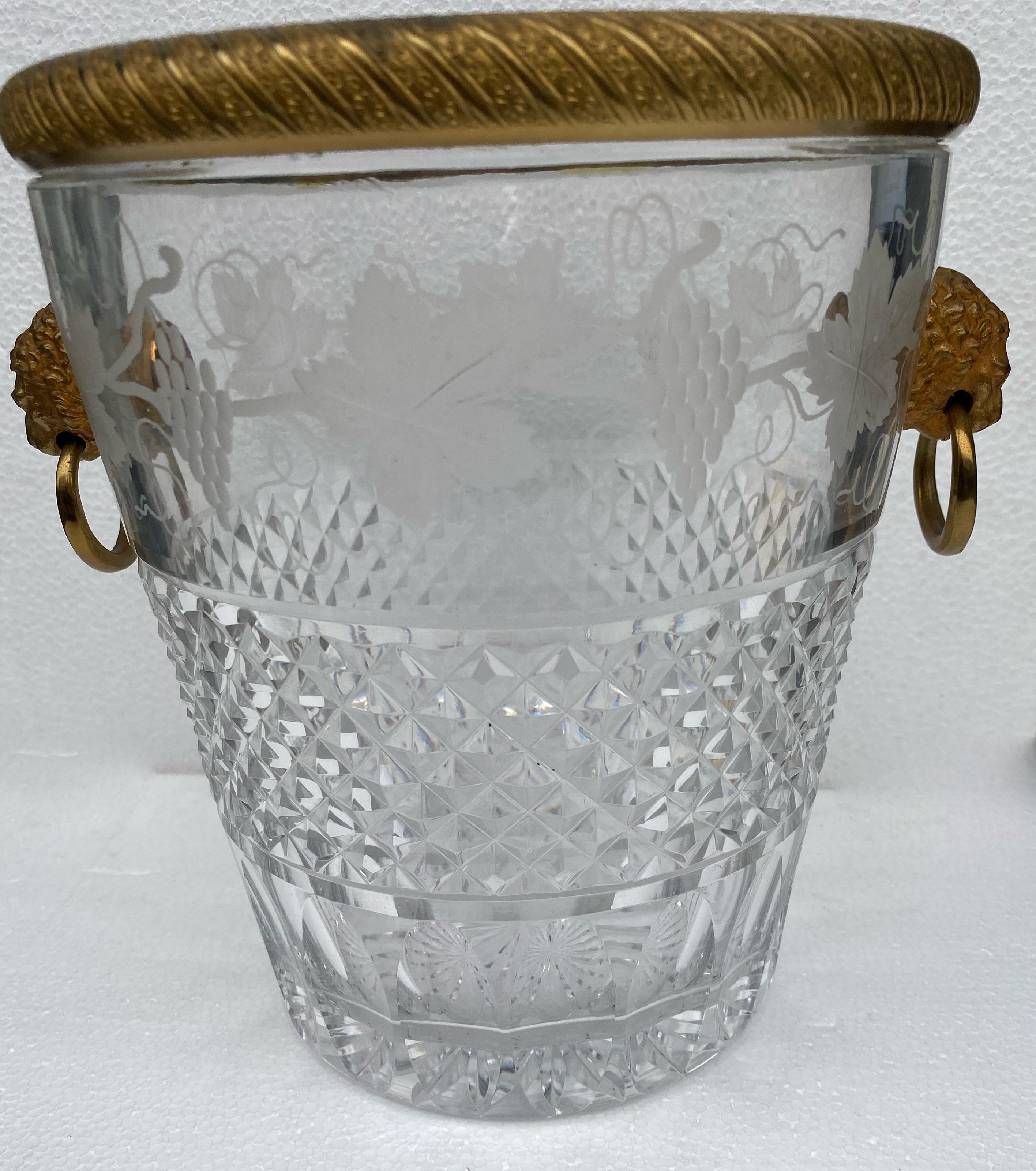 Champagne bucket in diamond point crystal and guilloché gilt bronze, St Louis.
The upper part is decorated with engravings with the attributes of the vine
Good condition,
Height: 24 cm
Diameter: 26 cm
Diameter of the vase without decoration: 20