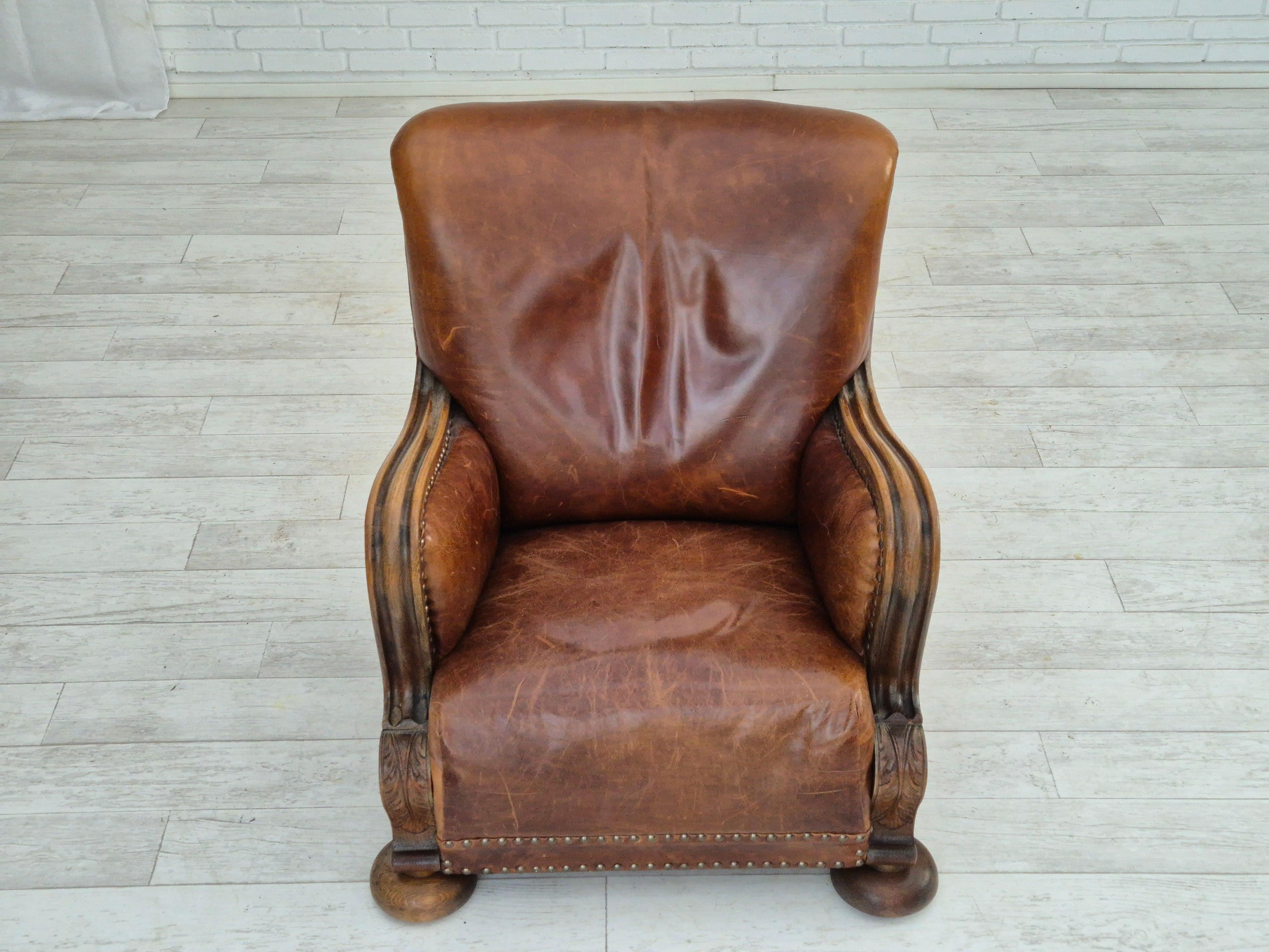 Leather 1950-60s, Danish relax chair, original condition, leather, oak wood. For Sale
