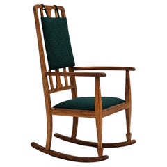 1950-60s, reupholstered Danish highback rocking chair, KVADRAT furniture wool.
