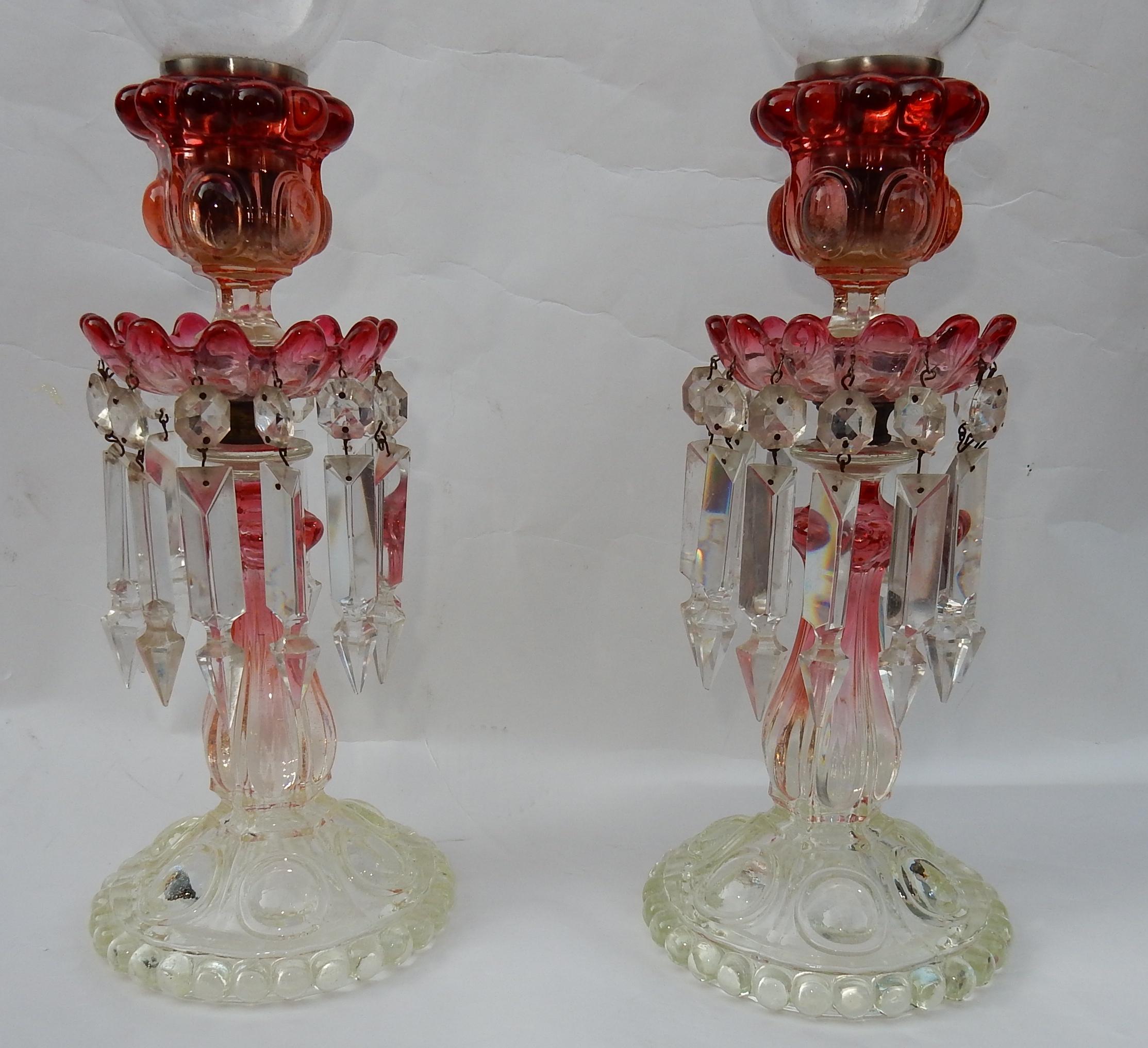 Pair of candlesticks with engraved candleholders: Height of the foot 30 cm
Baccarat embossed
prism crystals
Good condition, circa 1950-1970

Measures: Height 55 cm
Diameter 14 cm.