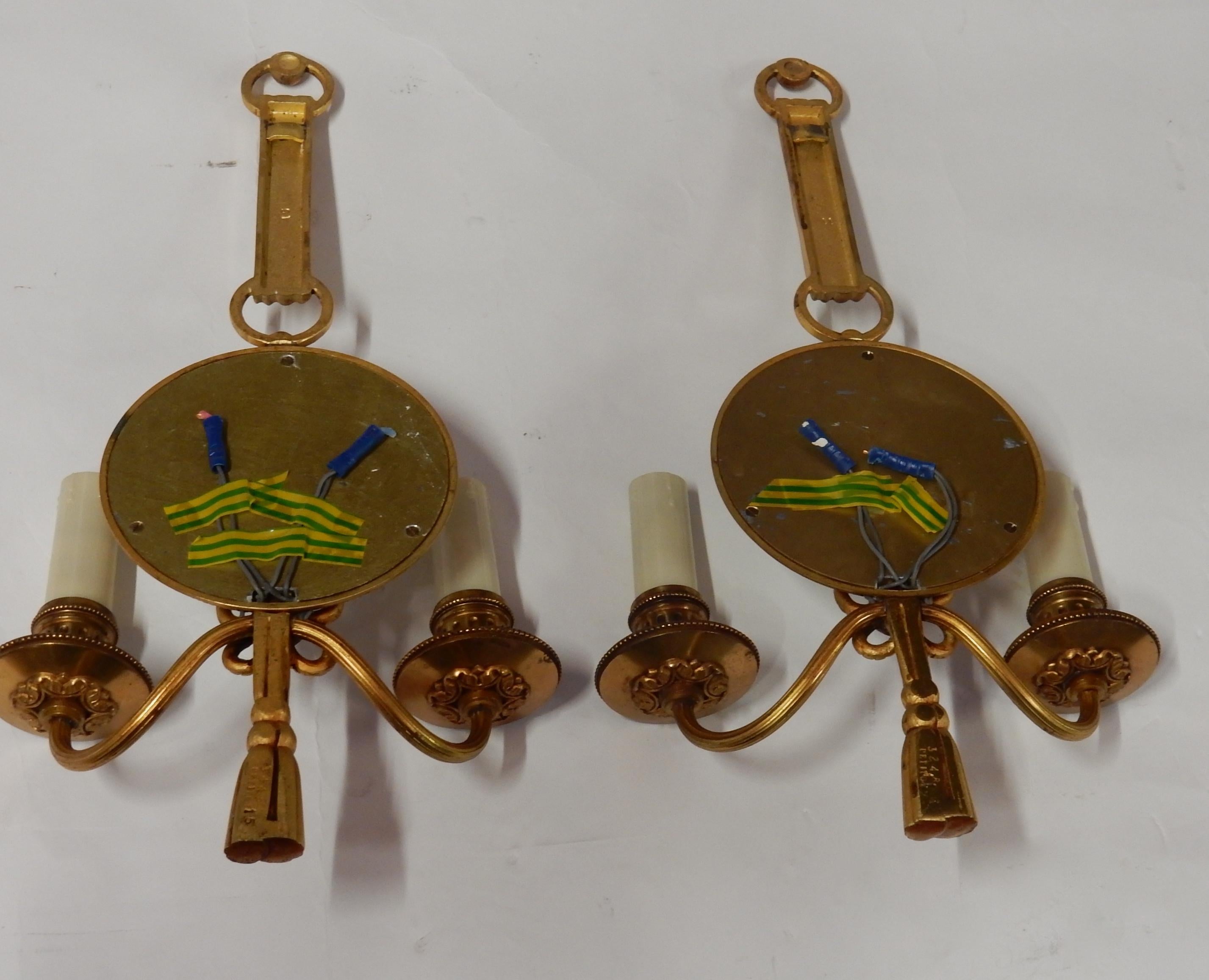 1950-1970 Paire d'appliques en bronze doré avec miroir convexe Signé Petitot en vente 1