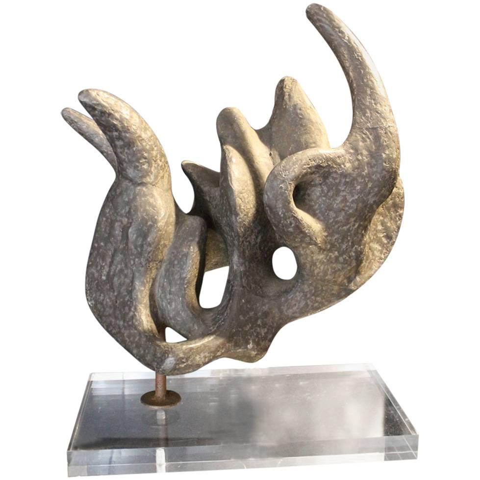 1950 Abstract Stone Sculpture Covered with Zinc, Plexiglass Base For Sale