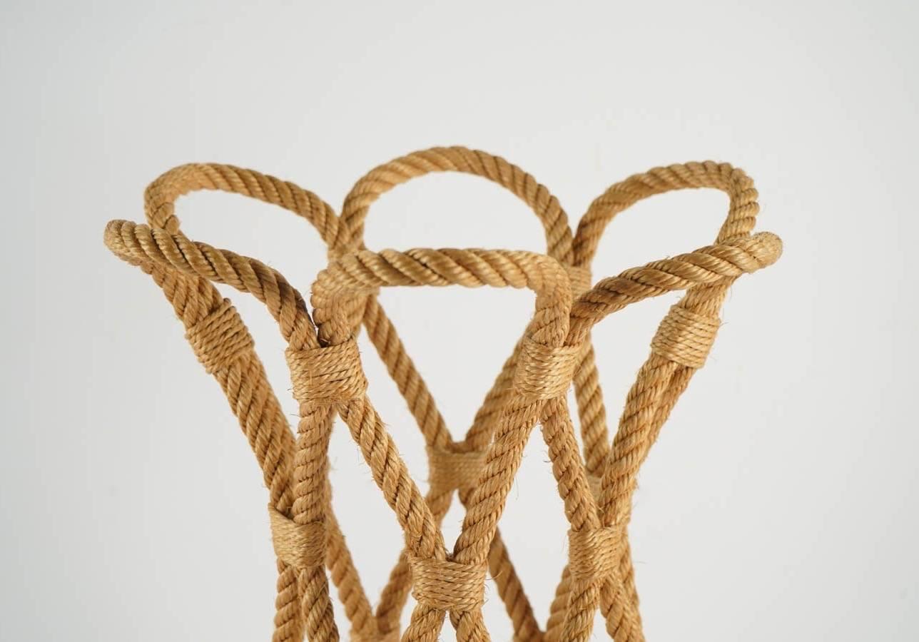 1950 Audoux & Minet rope umbrella stand
Lovely umbrella stand made of weaved rope.

Adrien Audoux and Frida Minet are known for their rope lights and furniture. Their first workshop have been founded in 1929 at Juan-les-Pins, near Nice, Côte