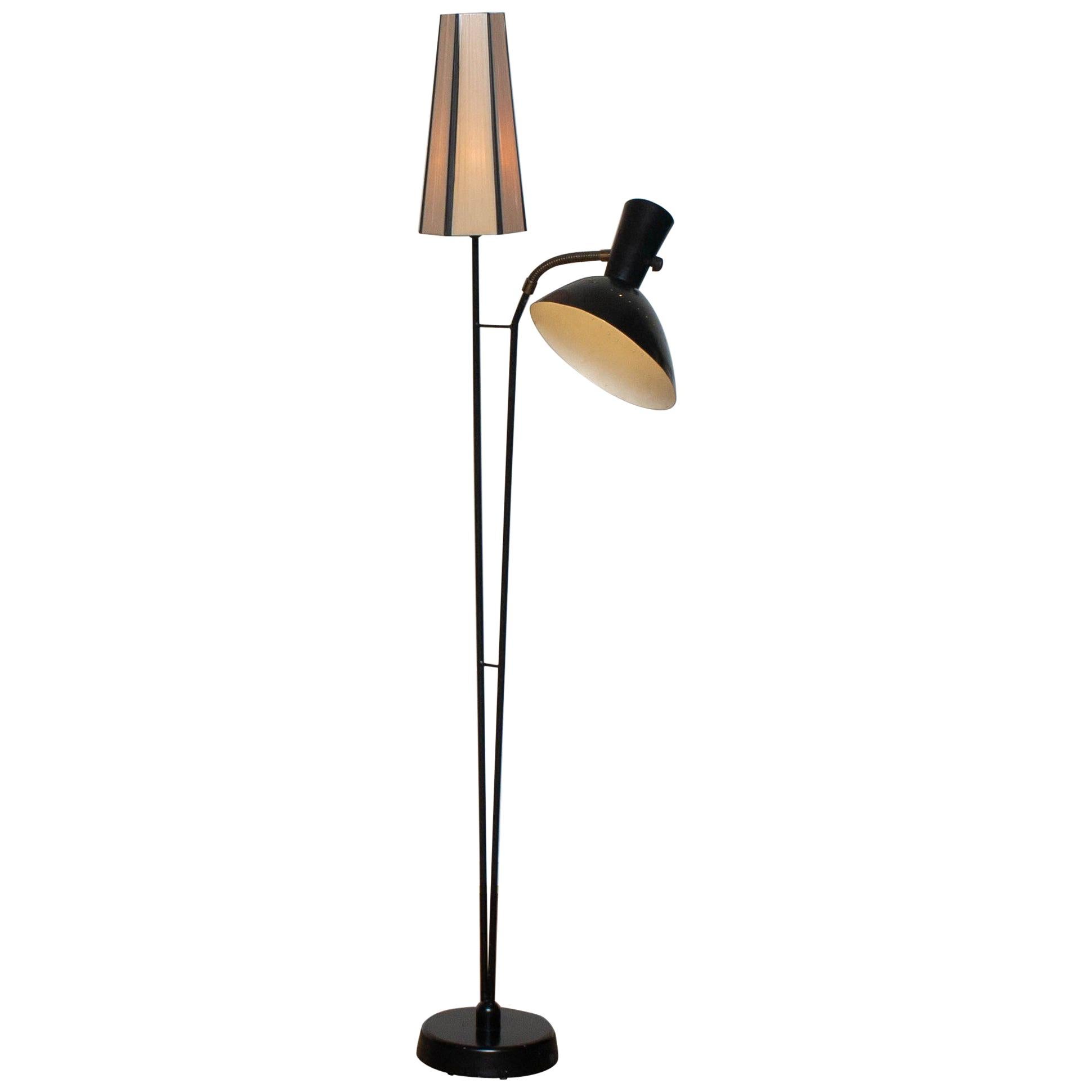 Beautiful and rare floor lamp made in the 1950s. Designed by Hans Bergström for Ateljé Lyktan in Sweden.
Measures: Height 136 cm or 54 inches.
Wide 60 cm or 24 inches.
Technically 100% and the overall condition is good.
  