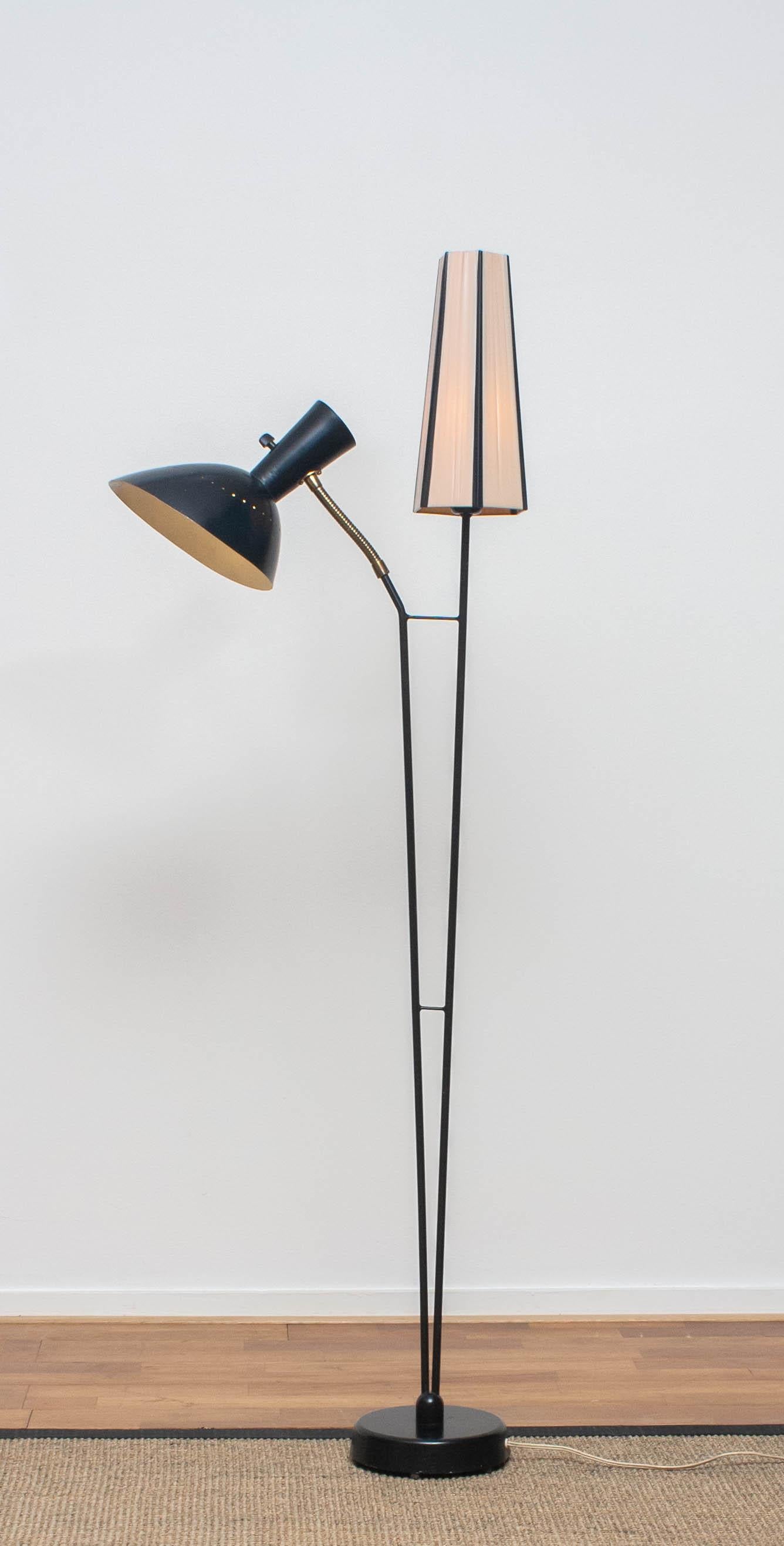 Beautiful and rare floor lamp made in the 1950s. Designed by Hans Bergström for Ateljé Lyktan in Sweden.
Measures: Height 136 cm or 54 inches.
Wide 60 cm or 24 inches.
Technically 100% and the overall condition is good.
 
