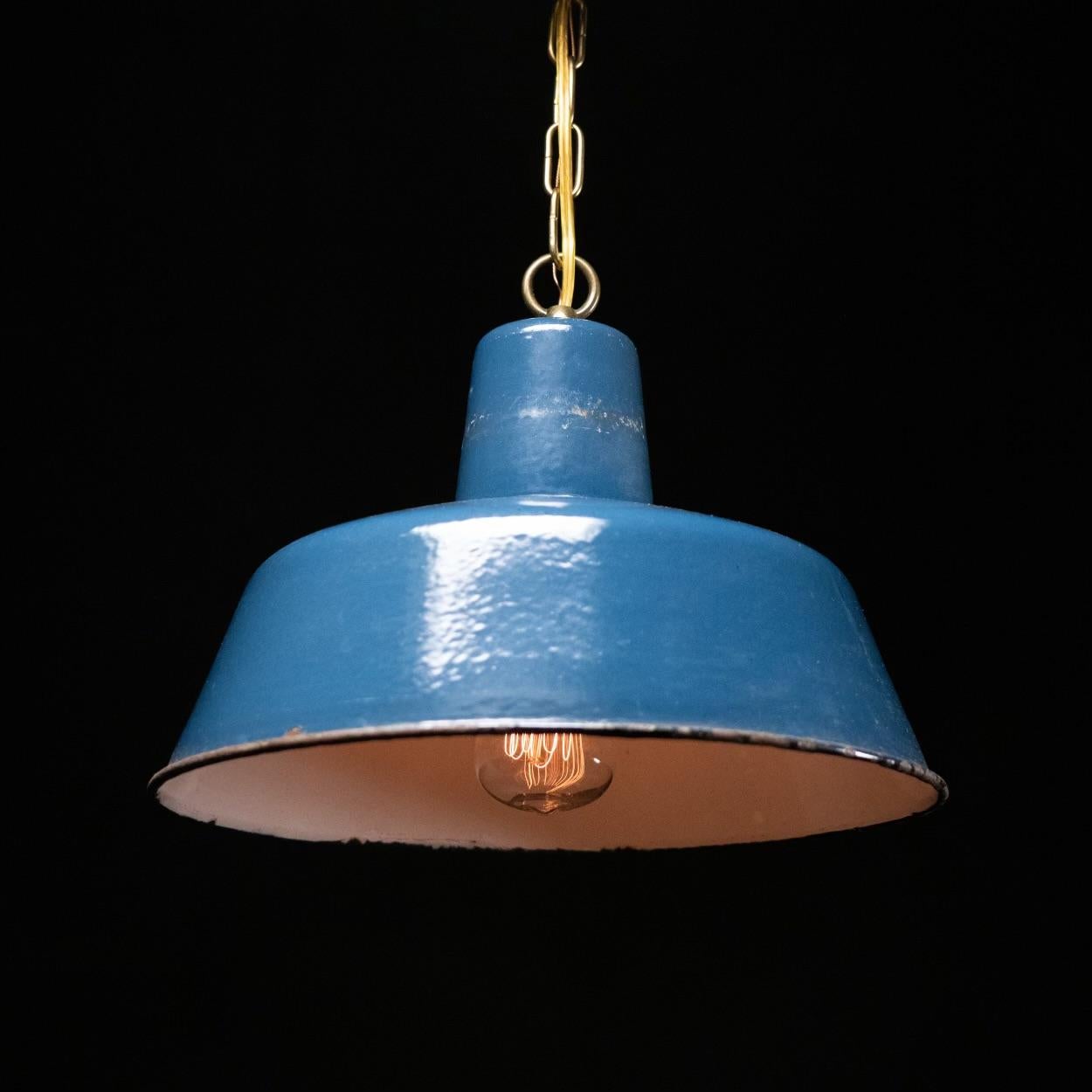 Sometimes its all about colour and form ... fantastic blue enamel , compact form on this factory European pendants ..they are rewired and ready for easy install for standard bulb size.
Priced per individual item. All lamps have been made suitable by