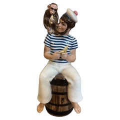 1950 Figure en céramique d'un marin avec un singe par Helen Scavini pour Tanagra