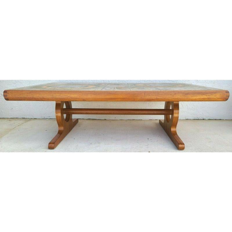 For FULL item description be sure to click on CONTINUE READING at the bottom of this listing.

Offering One Of Our Recent Palm Beach Estate Fine Furniture Acquisitions Of A 1950 Danish Modern Teak & Painted Ceramic Tile Coffee Table by Toften