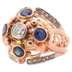 1950 dome diamonds and sapphires ring in 18k yellow gold