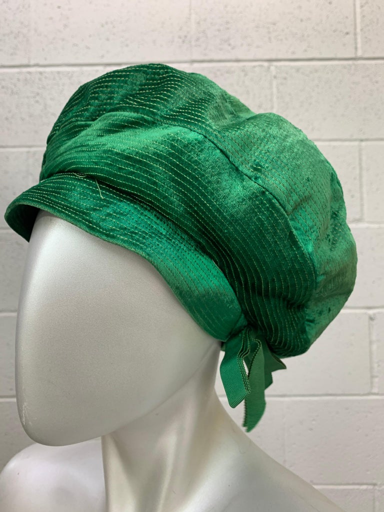 1950s Emerald green silk panne velvet tam-style hat with trapunto stitched, sunburst embellishment, wide velvet headband and bow detail. Size Medium. 