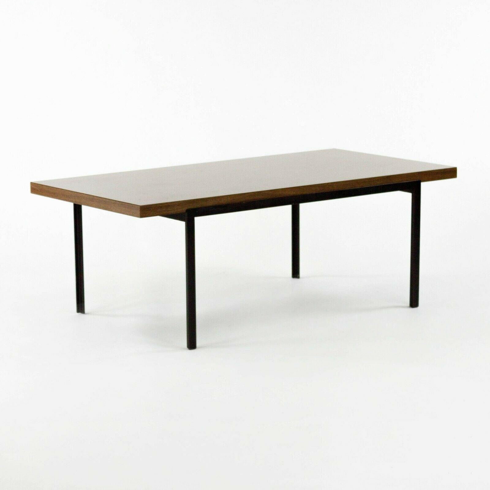 Listed for sale is a super rare, limited production T Angle coffee table, produced by Knoll Associates. This is an early and unique Florence Knoll design, which is noted in the 