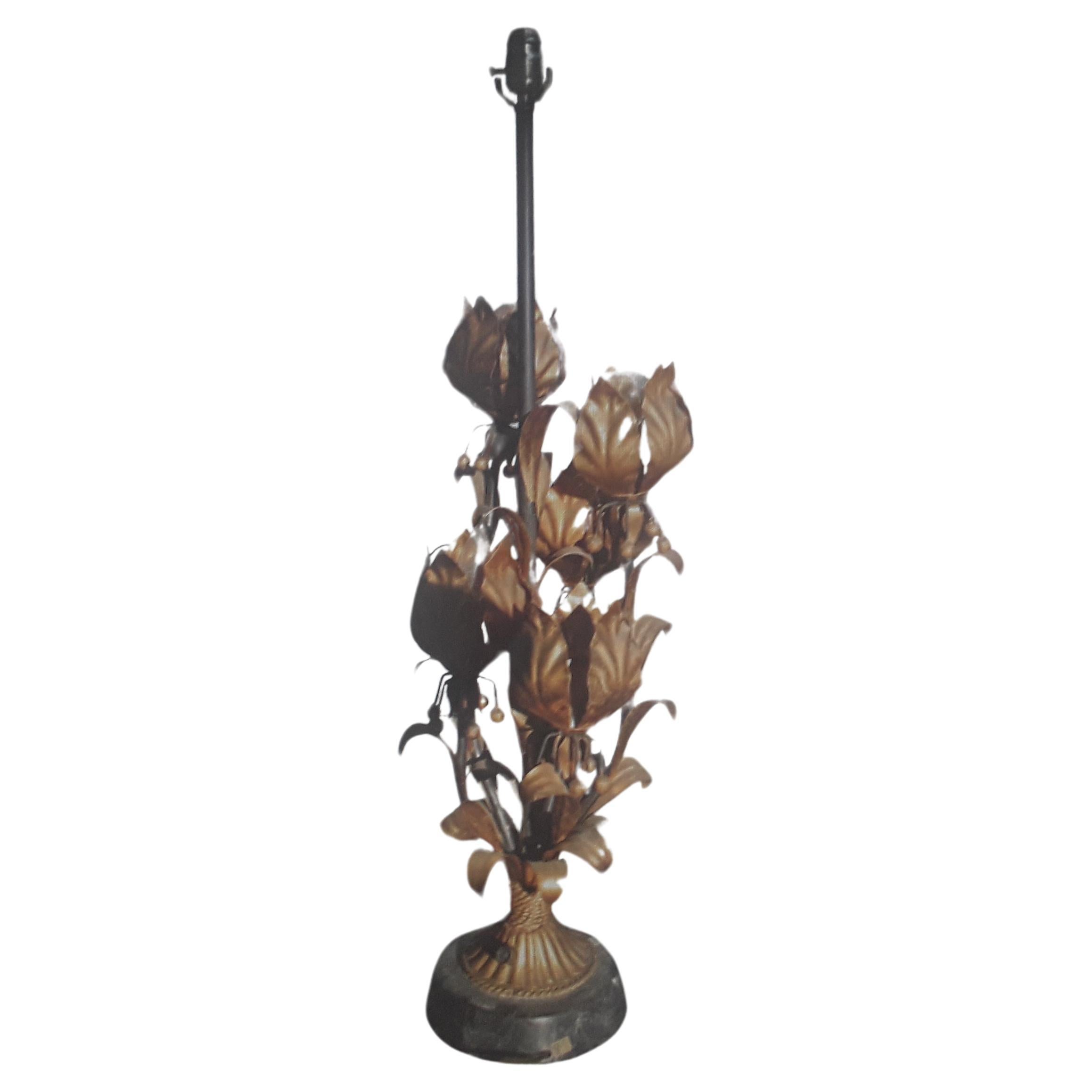 c1950's French Mid Century Modern Tall Gilt Tole Open Bud Lotus Table Lamp. This piece is in the style of Maison Charles France. 