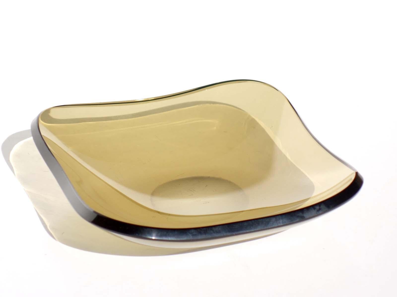 Coupe en cristal incurvée
Fontana Arte
1950

Cristal fumé
