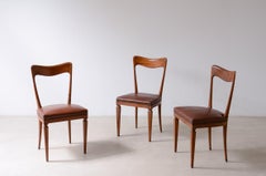 1950 Gianni Vigorelli Conjunto de ocho sillas de madera perfiladas