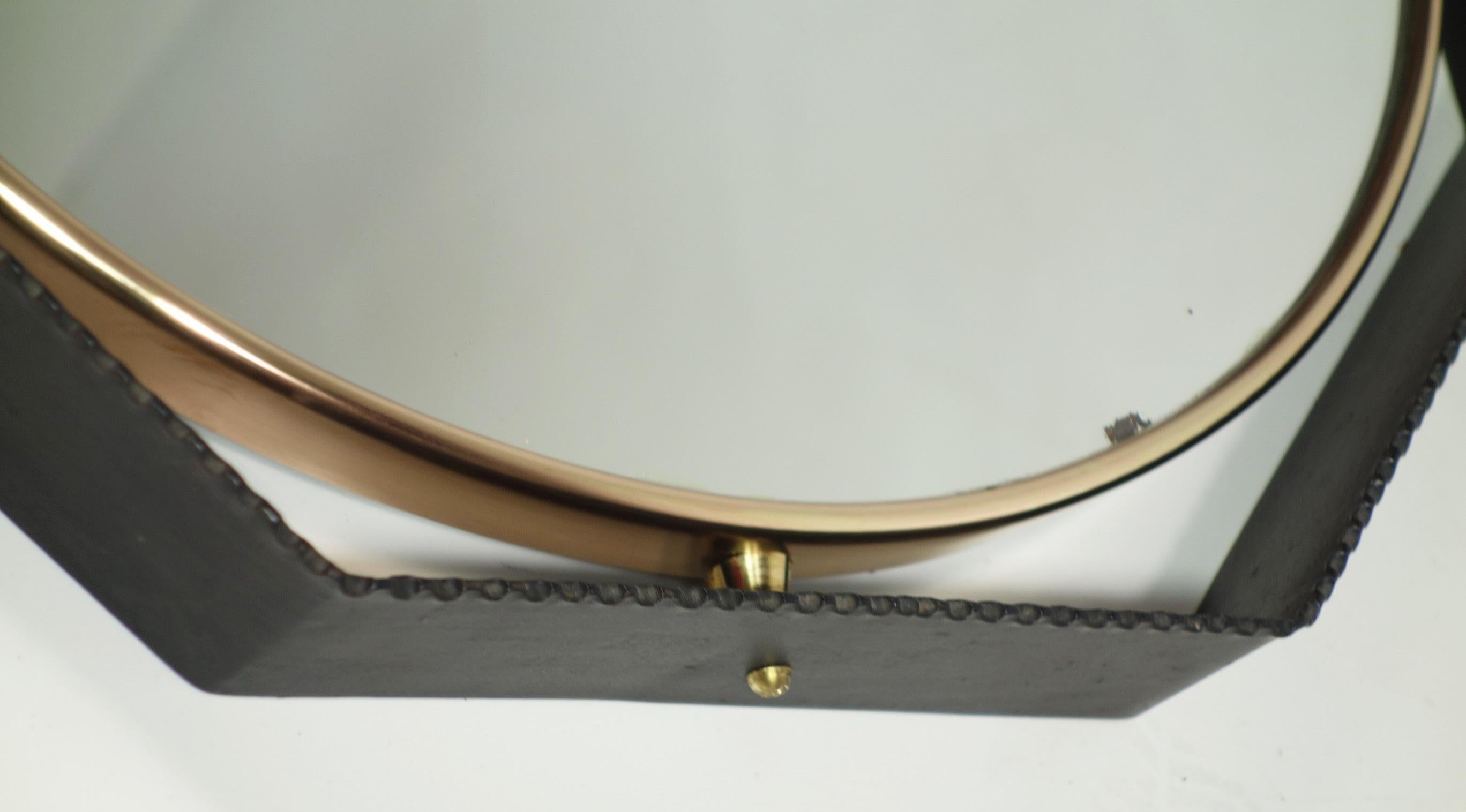 Wall Mirror
Italy, 1950

Black Iron and Brass Frame
Wood Back
Very good condiction

Original 1950 Italian manufacture of excellent quality. 