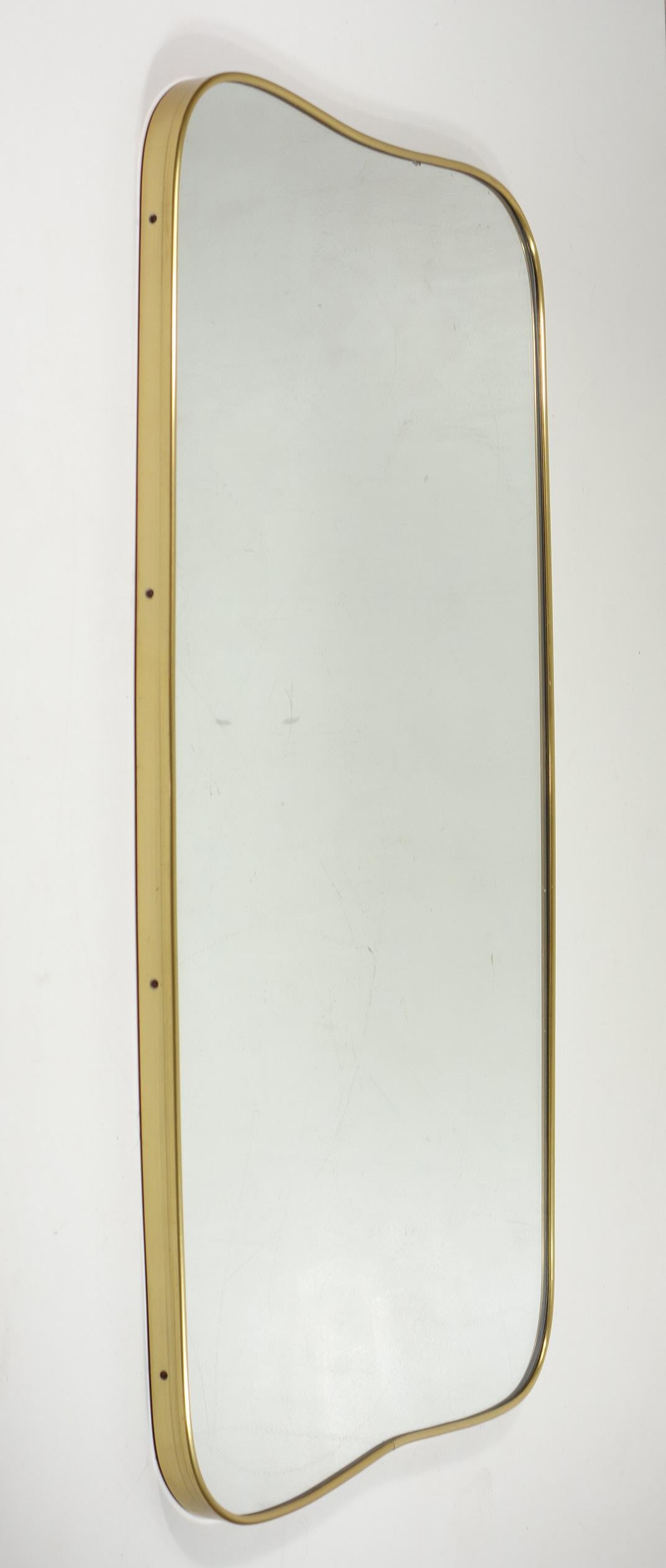 Italian Midcentury Modern Wall Mirror
1950

Gold Anodized Frame with original mirror
Wood Back
Excellent Condiction