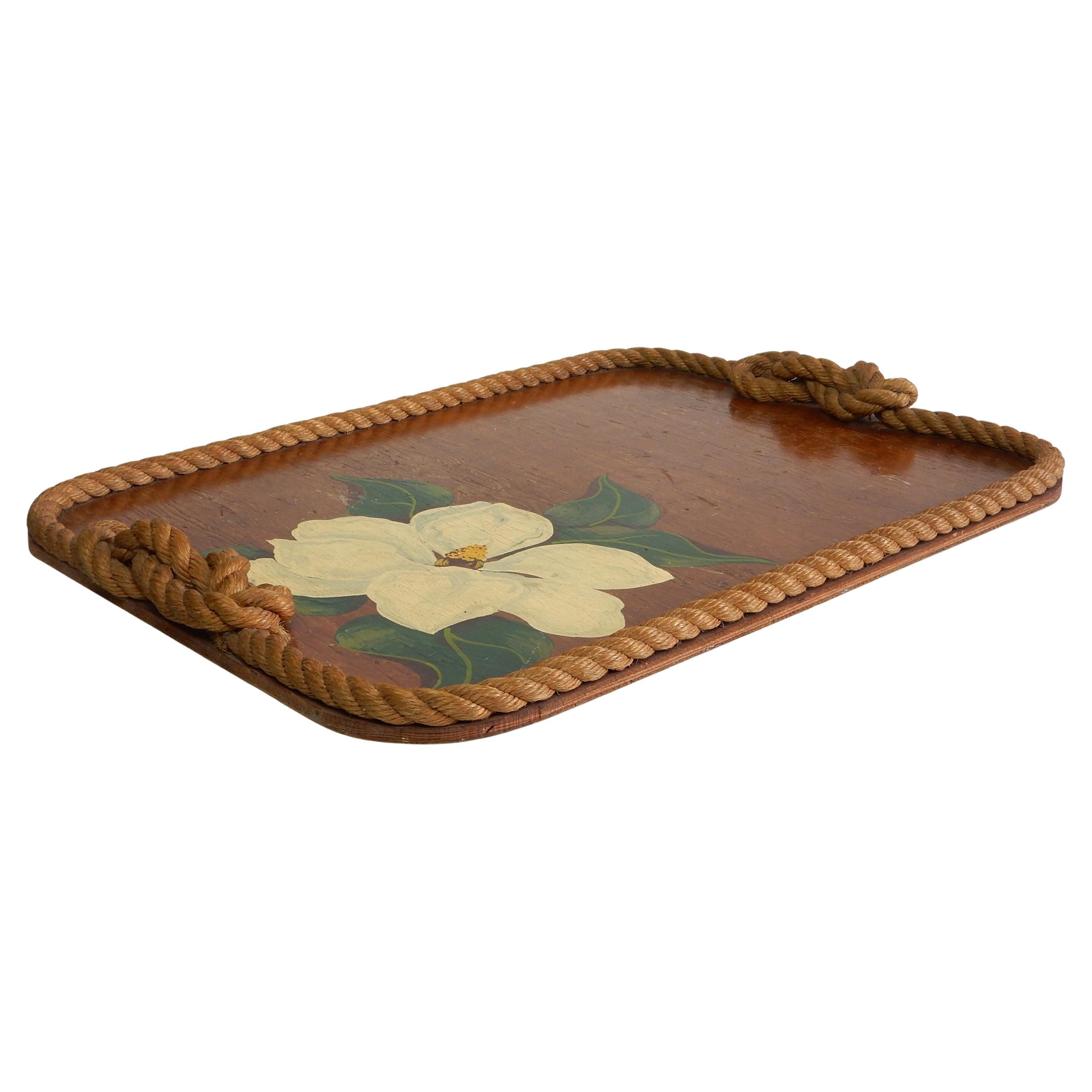 Large hand crafted and painted plywood serving tray from Josephine De Ville of Miami, trimmed in old hemp rope, circa 1950's.
Measures over 2 feet wide.
This tray has all the right soulful age & patina with no damage.
Use as display or a table top