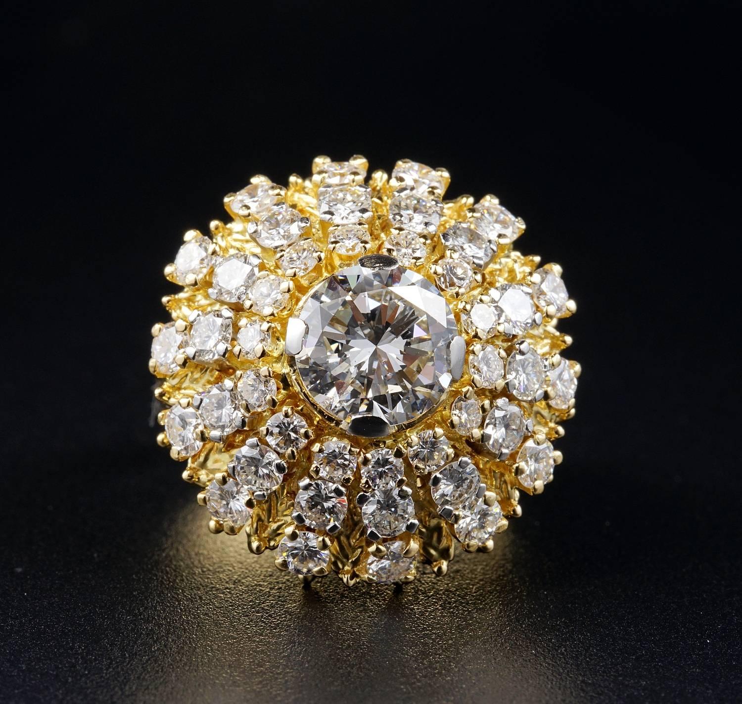 An Exceptional Vintage, mid century, large content Diamond cluster ring displaying all the glamour of the 50's jewellery, bold, attractive and full of lively Diamond Sparkle.
The ring has been hand crafted of solid 18 KT gold, looks very much the
