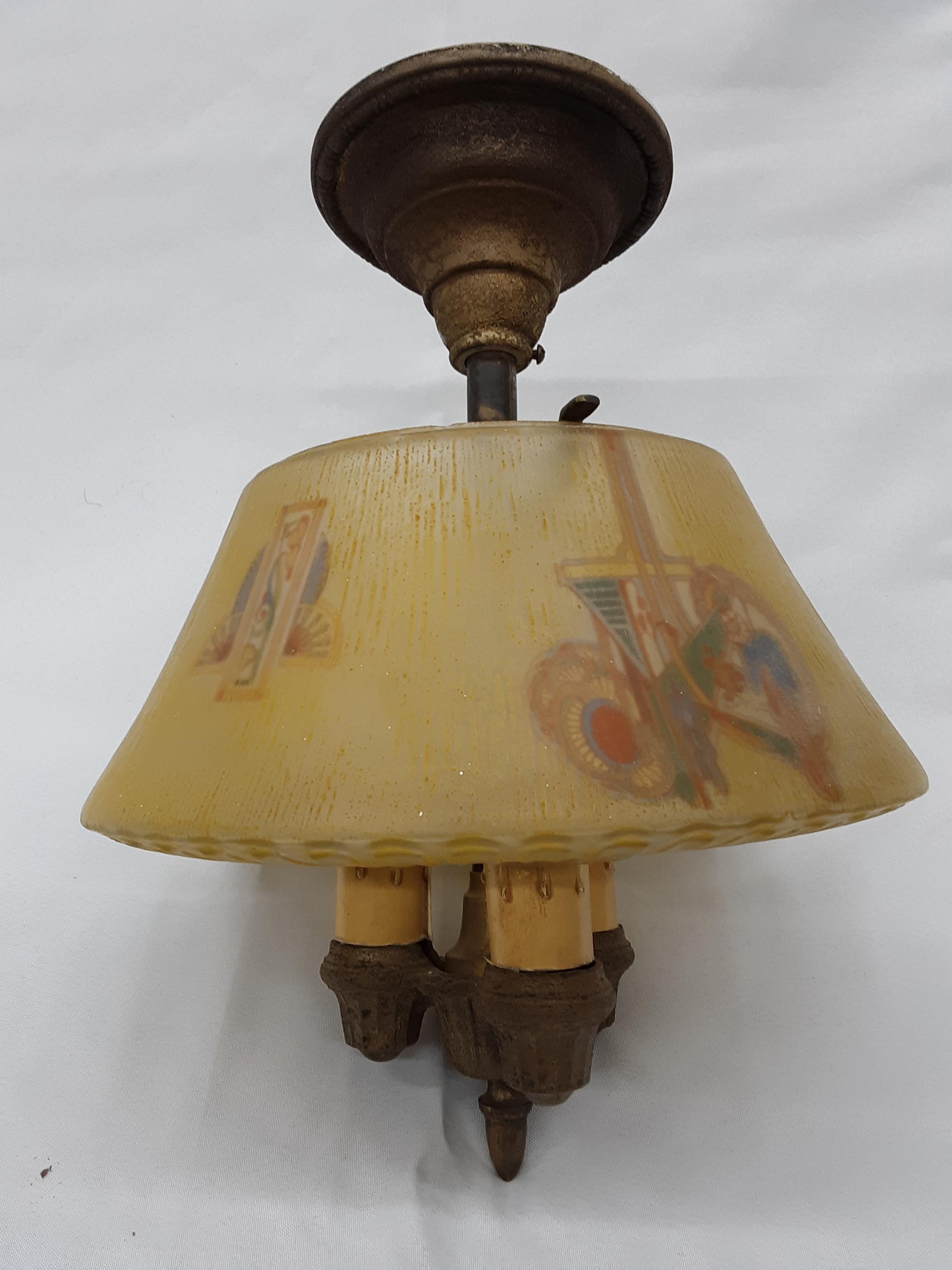 This is an incredibly unique 1950 lighting set. Painted glass and a true antique collectors pick.