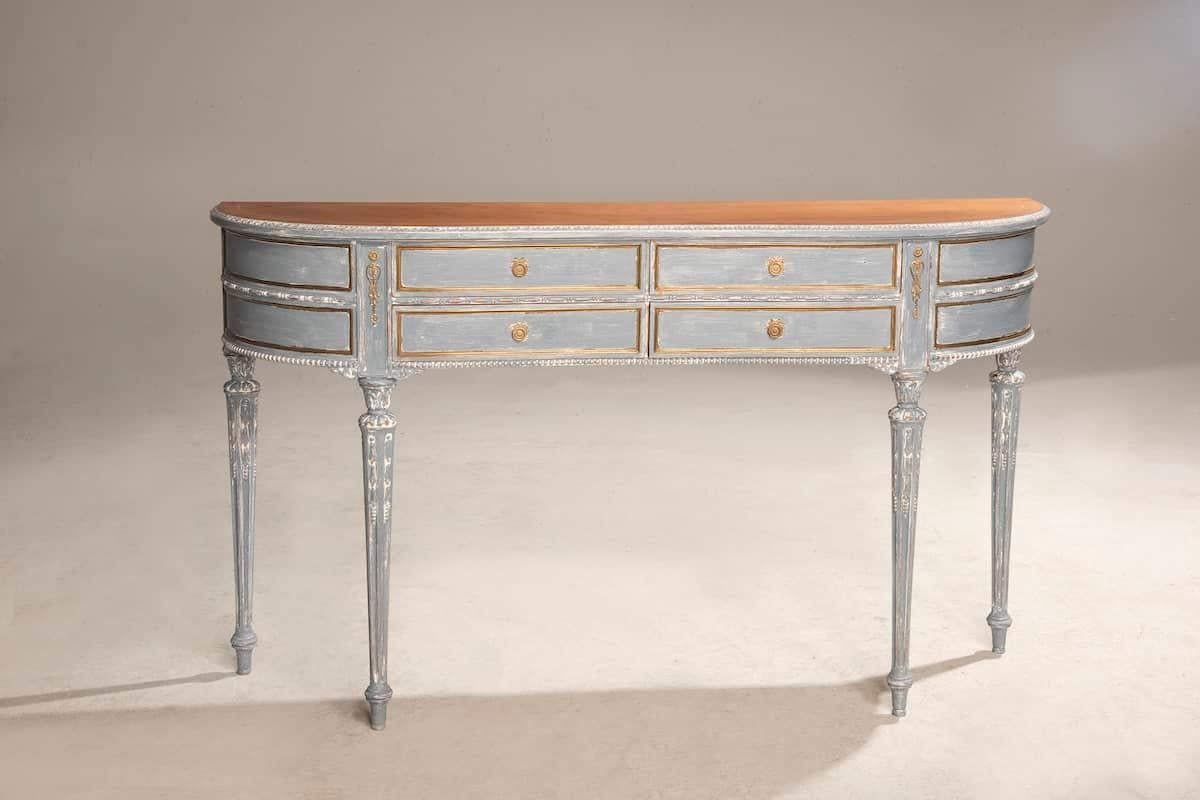 1950s-era CONSOLE made in Louis XVI style. The materials are walnut, the finish is shabby blue-grey with some golden details that give the furniture a touch of elegance. The chest of drawers' hardware and bronzes are original to the period. 
This