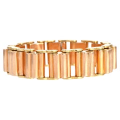 1950  Lujosa pulsera bicolor de oro amarillo y rosa de 18 quilates - 88 gramos