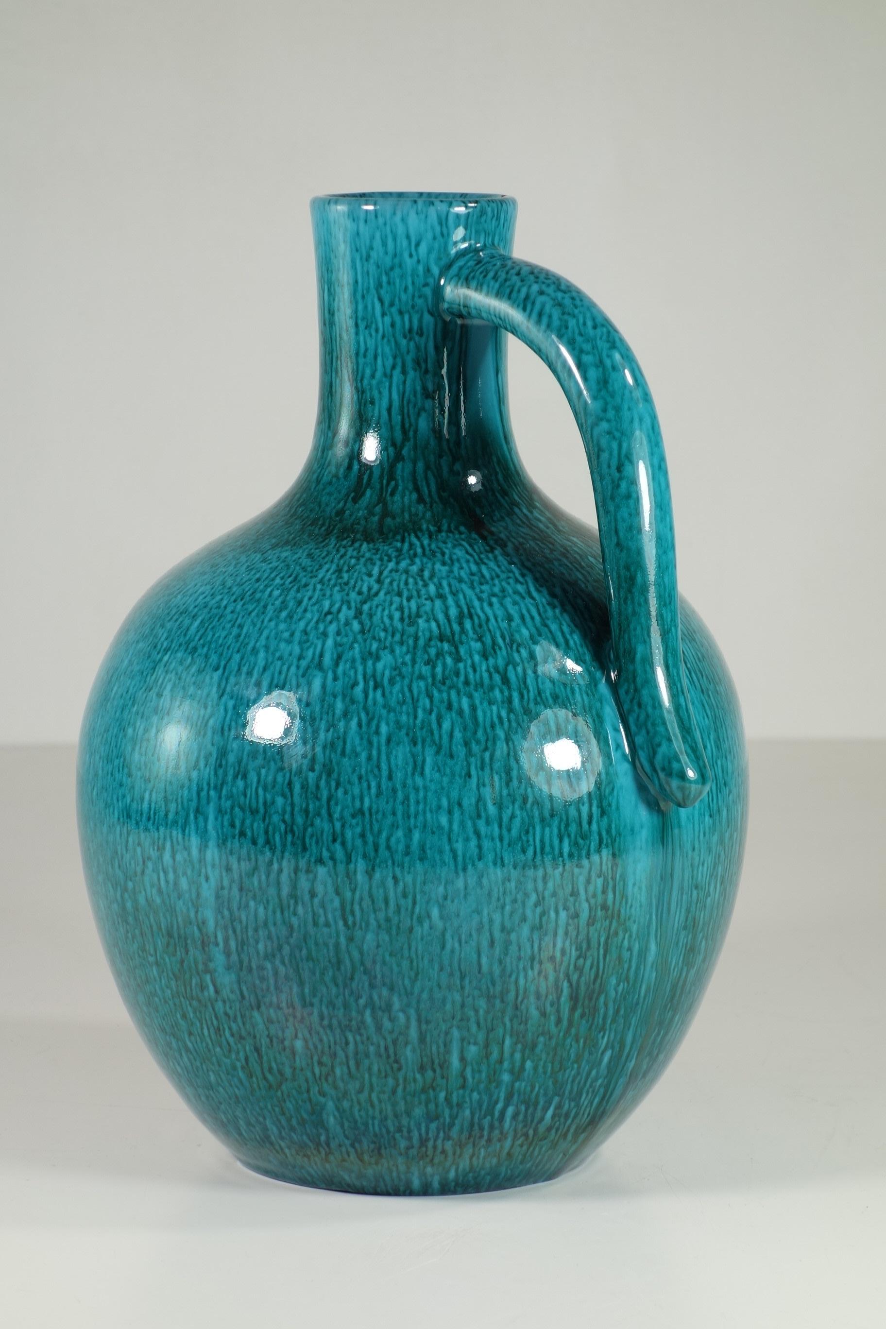 Ceramic Vase
Marcello Fantoni
1950

Enamel Ceramic
Fantoni sign under the bottom

Excellent condiction 