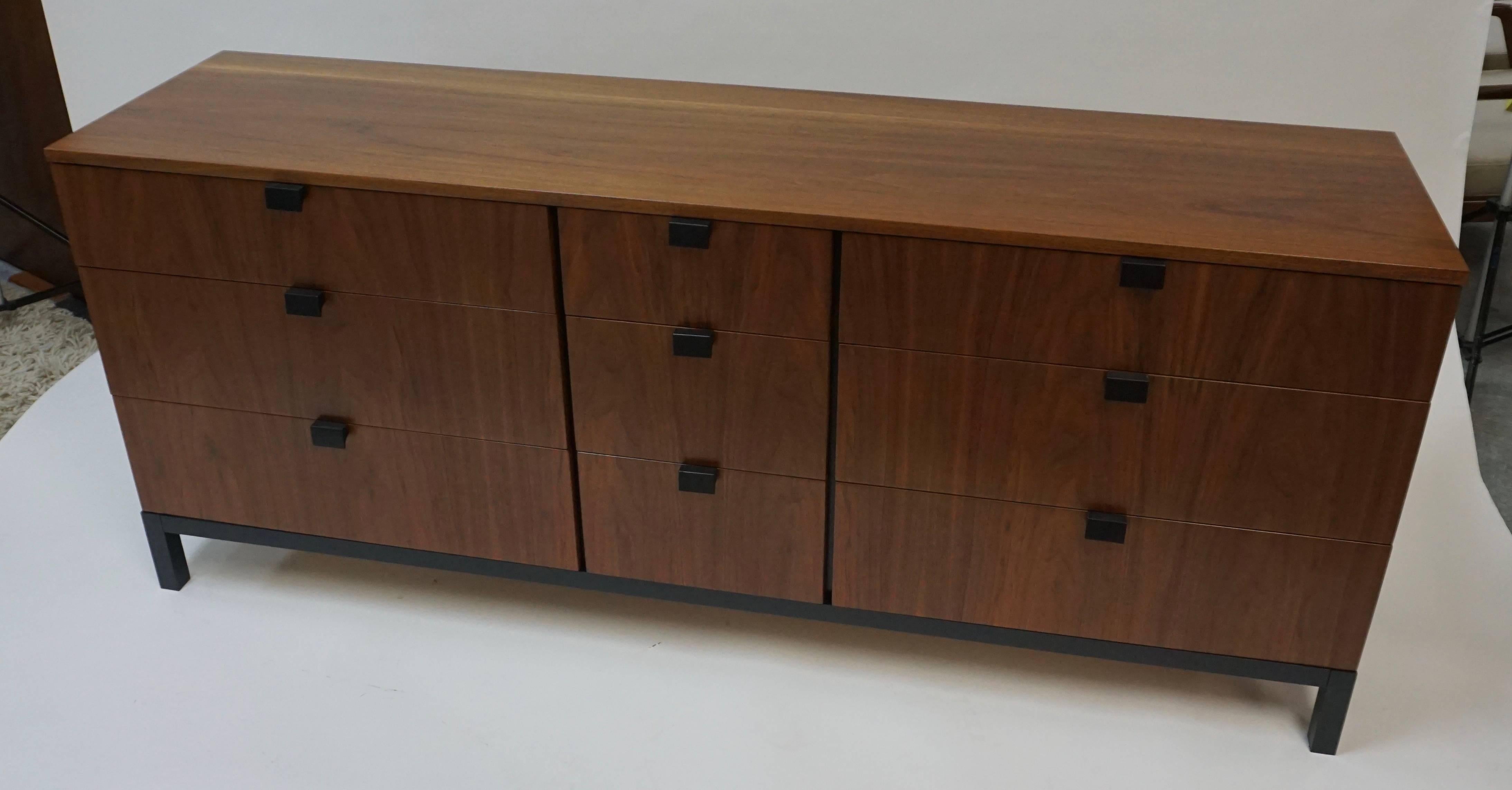Restored condition. Walnut. Nice warm red-brown color with some yellow tones. Drawers all work smoothly. Wooden drawer pulls. Great vibrant grain on top and drawer fronts. Just a couple very minor marks on surface under the new finish.