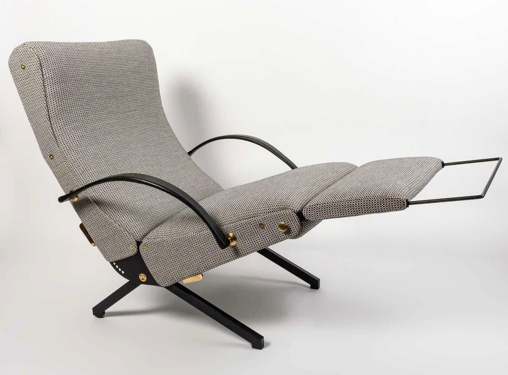 1950 Osvaldo Borsani, Relax armchair P40 1st Edition

Armchair P40 1st Edition Osvaldo Borsani from 1954 
Cover redone in the original spirit.
Model in Jab tranquility fabric.
Structure in tubular iron. 
Two brass handles to adjust the back