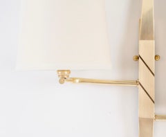 1950 Pair of bronze and brass wall sconces by Maison Arlus
