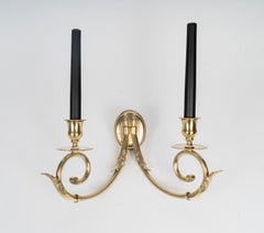 1950 Pair of bronze wall lights by Lucien Gau