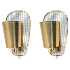 1950 Pair of gilded brass wall lights by Günter Trieschmann