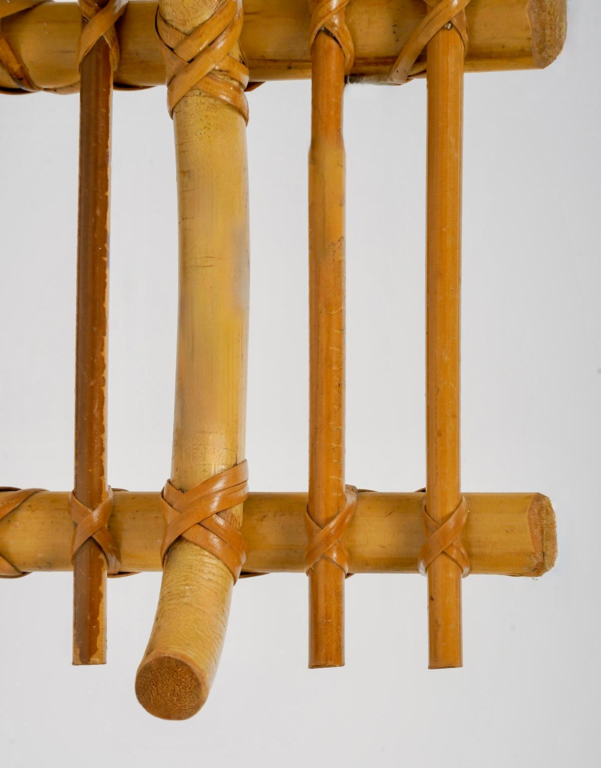 French 1950 Pair of Louis Sognot rattan sconces For Sale