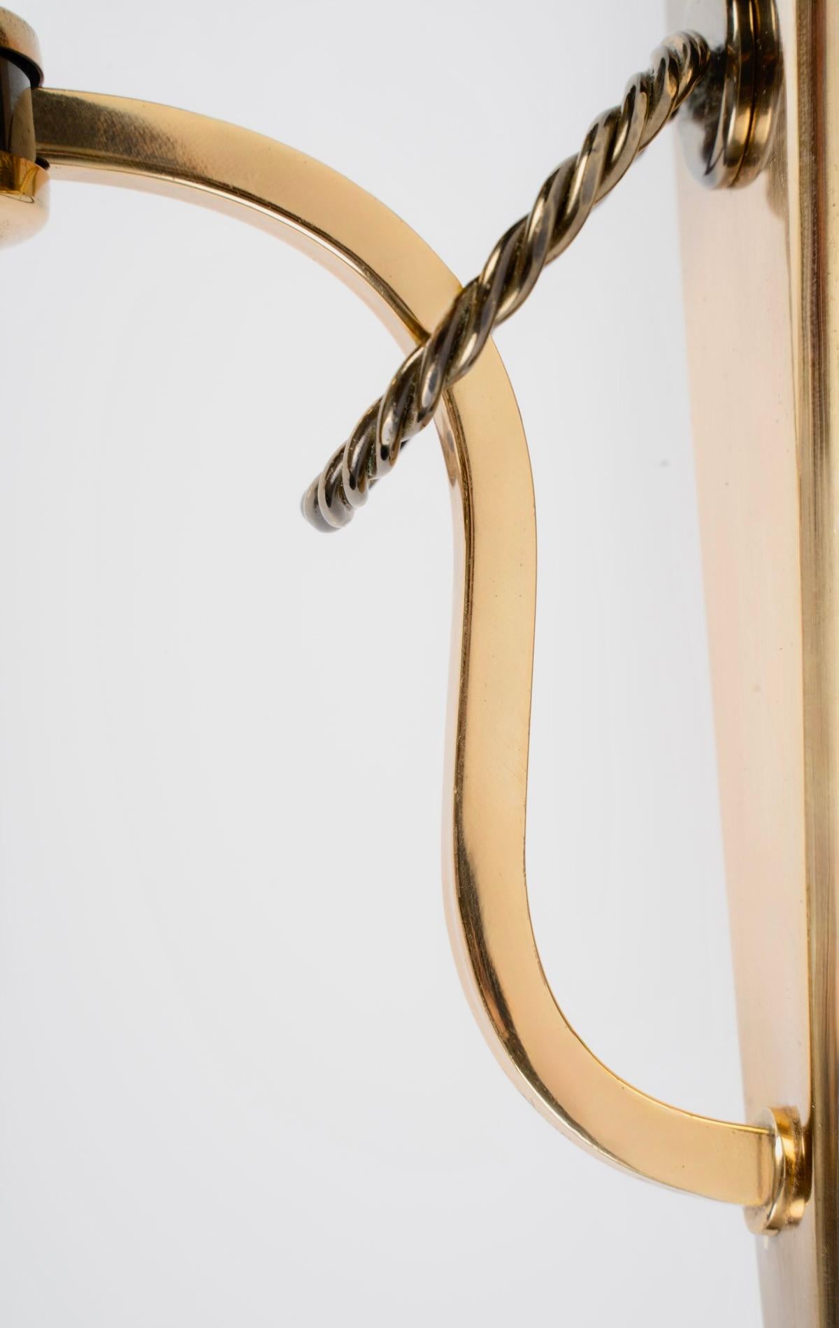 1950 Pareja de lámparas de pared con anillos Atelier Petitot Latón en venta