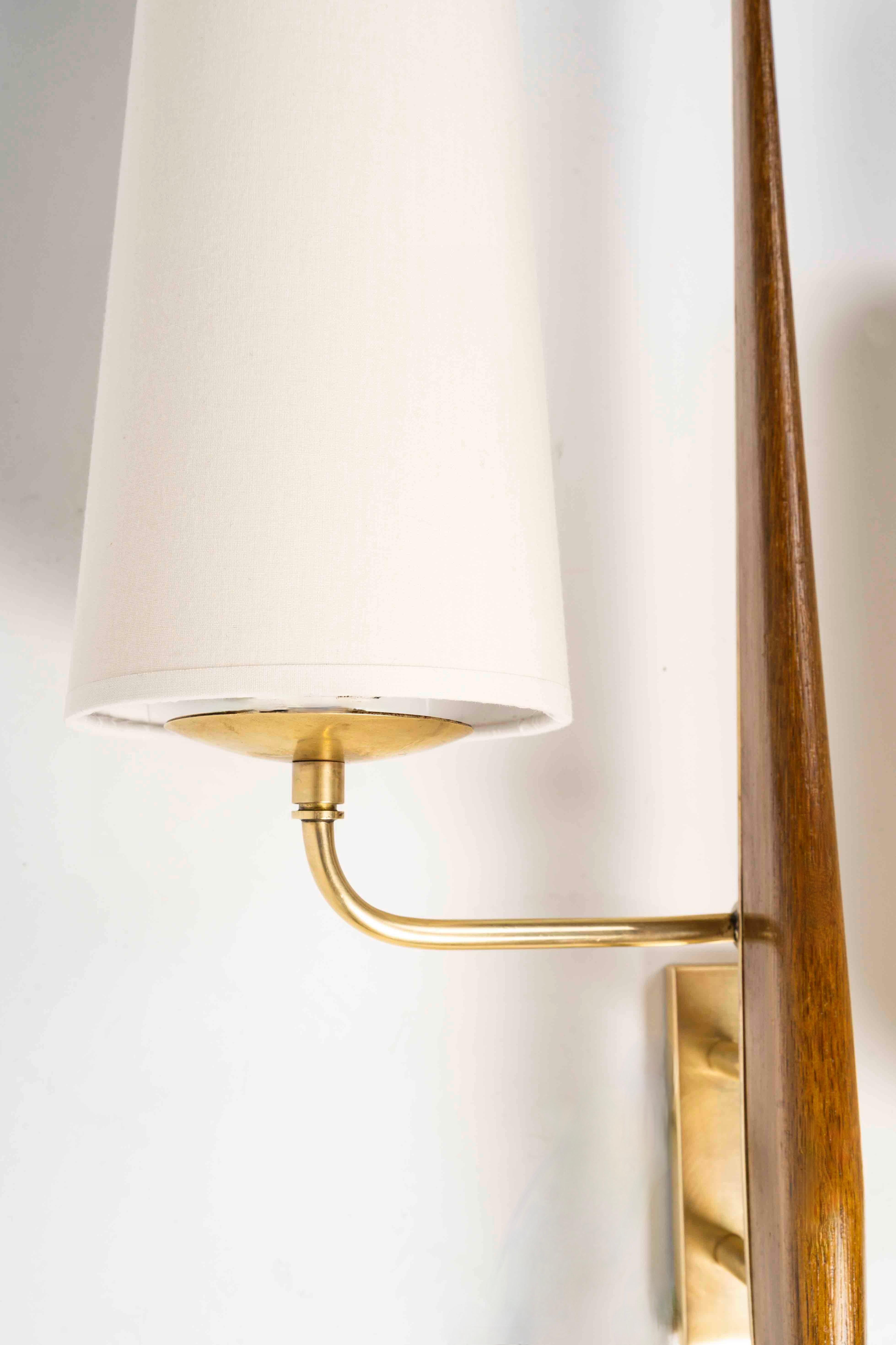 French 1950 Rare Large pair of wall sconces by Maison Arlus For Sale