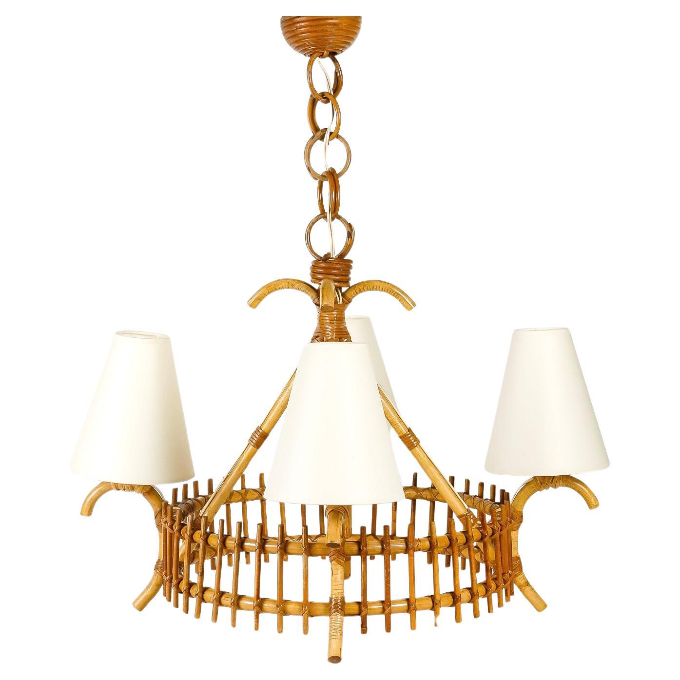 1950 Rattan chandelier by Louis Sognot For Sale