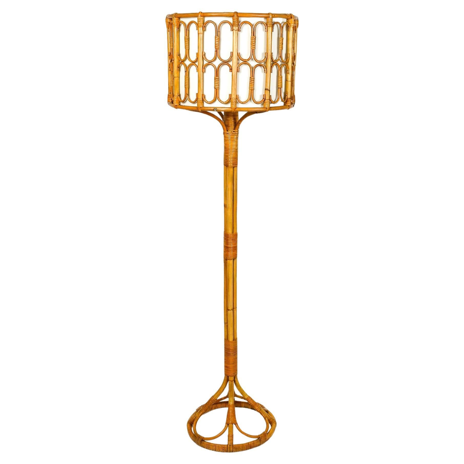 1950 Rattan floor lamp by Louis Sognot For Sale